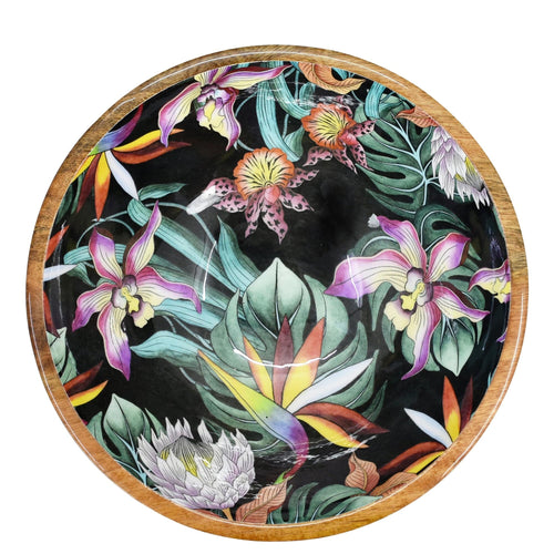 Decorative round tray featuring a colorful floral and botanical enamel inlay on a black background by Anuschka.