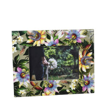 Load image into Gallery viewer, An Anuschka Wooden Printed Photo Frame - 25004 displaying a partially visible photograph with a person holding a bouquet.
