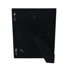 Load image into Gallery viewer, Black Anuschka wooden printed photo frame with stand, rear view on a white background.
