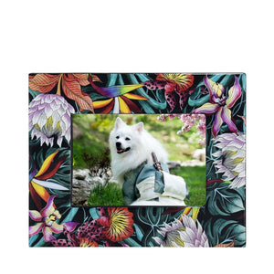 A white dog with a backpack sitting on a Anuschka Wooden Printed Photo Frame - 25004.