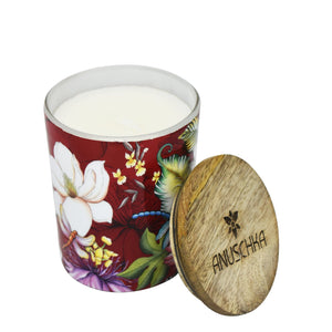 A hand-painted, luxurious Anuschka Printed Glass Candle Jar - 25005 with a wooden lid on a white background.