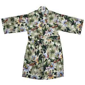 Silky floral and bird patterned Anuschka kimono-style robe on a white background, perfect for self-care spa days.