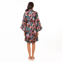 Load image into Gallery viewer, A woman from behind wearing a Anuschka floral silk Robe - 3343 with her hair down.
