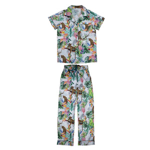 Matching tropical print Anuschka pajama set on a white background.