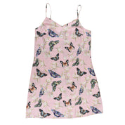 Sleeveless pink slip dress with butterfly print design and adjustable shoulder straps, isolated on white background. (Product Name: Anuschka Slip Dress - 3346)