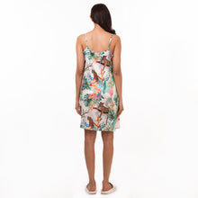 Load image into Gallery viewer, Woman standing facing away from the camera, wearing an Anuschka delicate prints slip dress - 3346.
