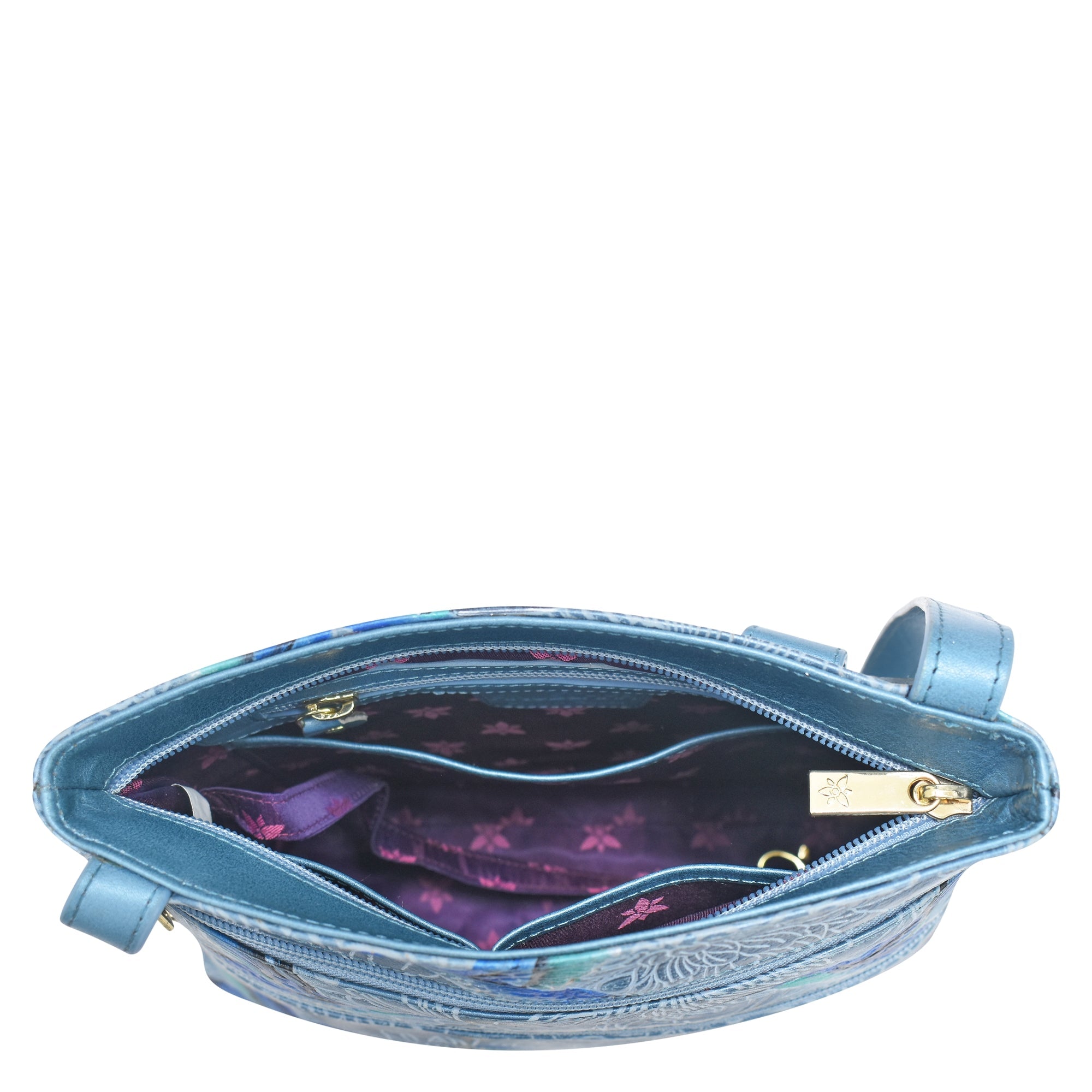 Anuschka Medium Crossbody With Double Zip Pockets - 447 opened to display the interior lining and contents.