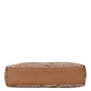 Brown and patterned rectangular zippered Anuschka genuine leather wallet isolated on a white background.