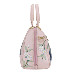 Pink floral leather Zip Around Classic Satchel - 625 backpack with multiple pockets on a white background by Anuschka.