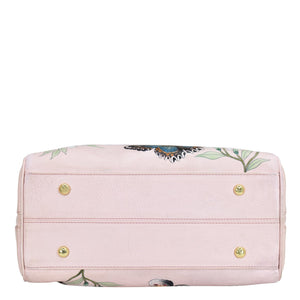 Pink floral-patterned leather Zip Around Classic Satchel - 625 by Anuschka on a white background.