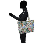 A person modeling a Anuschka Classic Work Tote - 664.