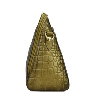 Gold-colored, triangular-shaped Anuschka Zip Around Travel Organizer - 668 with a crocodile skin texture and a zipper closure seen from the side.