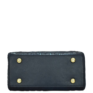 Anuschka Zip Around Travel Organizer - 668 with black leather rectangular design and gold-tone stud accents, featuring RFID protection.
