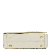 Load image into Gallery viewer, Anuschka&#39;s Ivory-colored Flap Crossbody - 683 with floral accents and gold-tone hardware.
