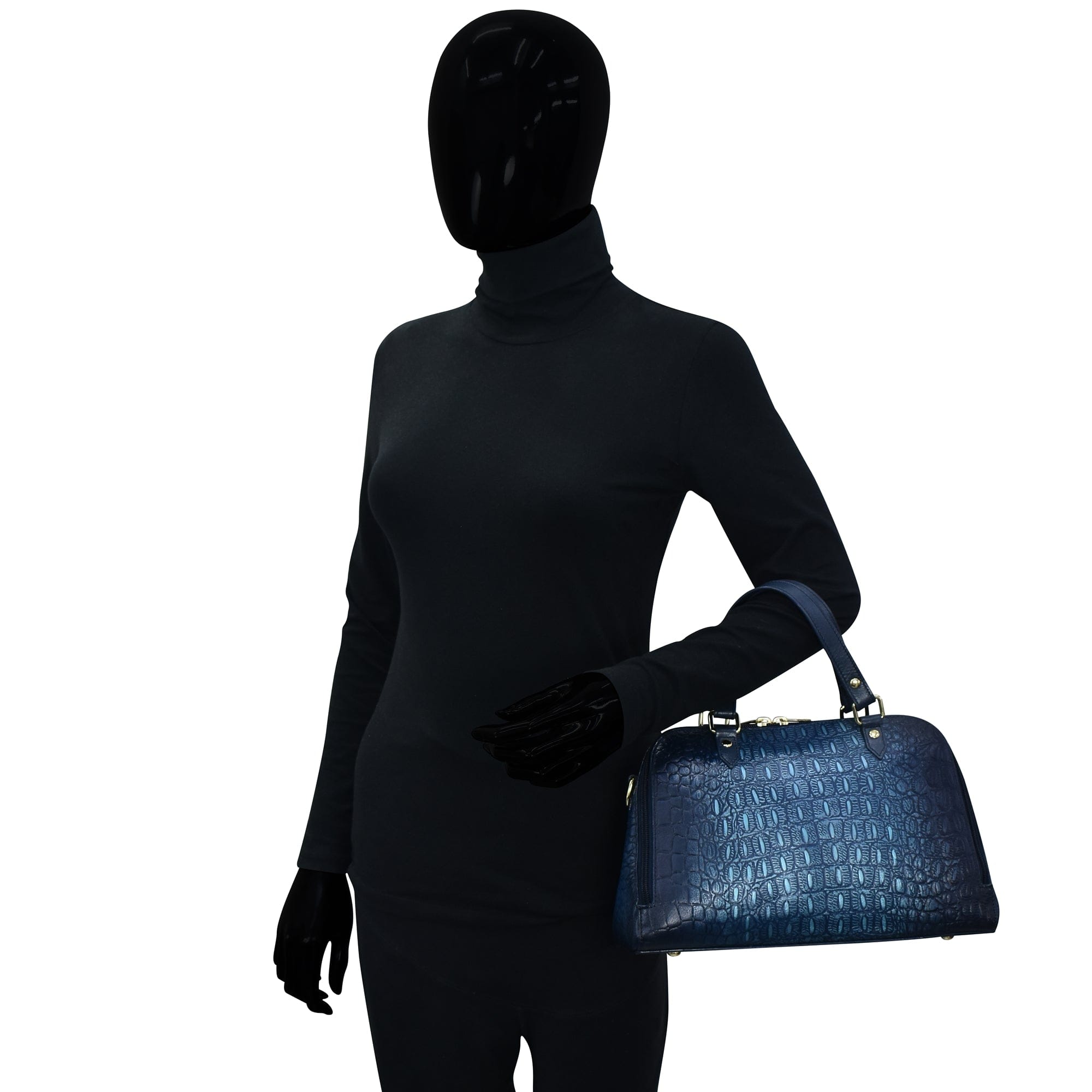 Mannequin dressed in a black turtleneck and gloves holding a blue Anuschka Wide Organizer Satchel - 695.