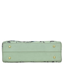 Load image into Gallery viewer, Mint green genuine leather women&#39;s wallet with floral pattern and gold-tone stud details from Anuschka&#39;s Wide Organizer Satchel - 695 collection.
