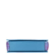 A side view of a blue and pink Anuschka Triple Compartment Crossbody - 696 wallet, organized against a white background.