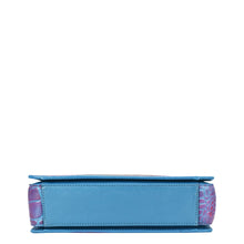 Load image into Gallery viewer, A side view of a blue and pink Anuschka Triple Compartment Crossbody - 696 wallet, organized against a white background.
