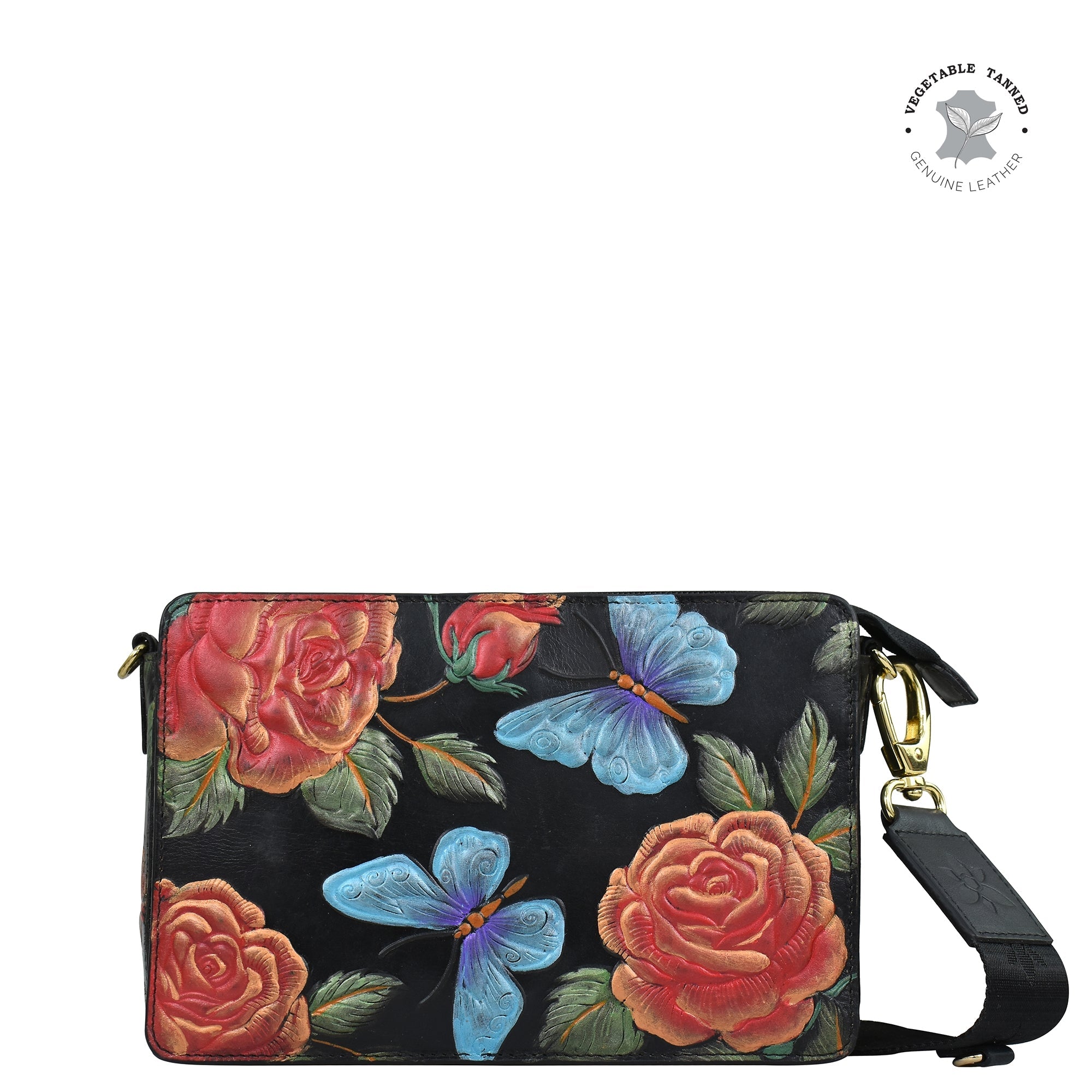 The Anuschka Triple Compartment Crossbody - 696 is a black genuine leather clutch adorned with rose and butterfly designs, complete with a detachable adjustable strap, triple compartment functionality, and elegant gold hardware.