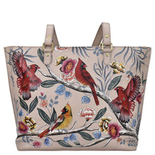 Load image into Gallery viewer, An Anuschka Large Zip Top Tote - 698 with a hand-painted artwork of floral and bird design.
