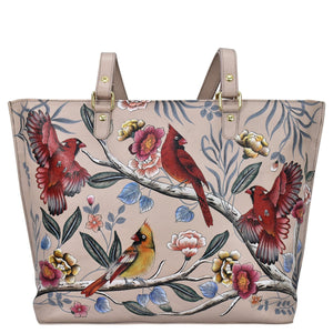 An Anuschka Large Zip Top Tote - 698 with a hand-painted artwork of floral and bird design.
