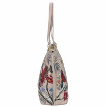 Load image into Gallery viewer, Floral embroidered cream-colored Anuschka Large Zip Top Tote - 698 with a shoulder strap.
