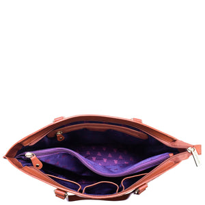 A Large Zip Top Tote - 698 by Anuschka with a purple interior.