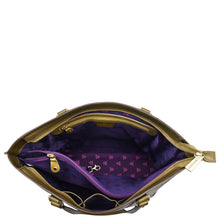 Load image into Gallery viewer, An Anuschka Large Zip Top Tote - 698 with a purple interior and a small keychain inside, adorned with hand painted designs.
