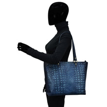 Load image into Gallery viewer, A mannequin with a black headpiece and a black outfit carrying a large Anuschka 698 hand-painted tote bag on its shoulder.

