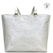 Load image into Gallery viewer, White floral embossed Anuschka genuine leather Large Zip Top Tote - 698 with gold-tone hardware details.
