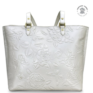 White floral embossed Anuschka genuine leather Large Zip Top Tote - 698 with gold-tone hardware details.