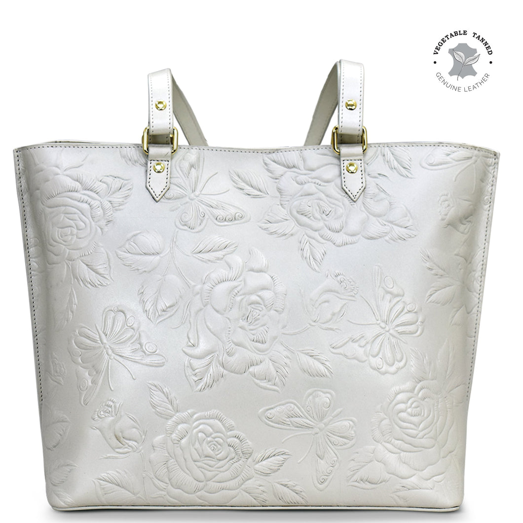 White floral embossed Anuschka genuine leather Large Zip Top Tote - 698 with gold-tone hardware details.