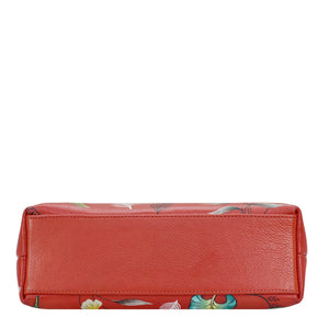Red floral-patterned, genuine leather Medium Frame Crossbody - 700 by Anuschka on a white background.