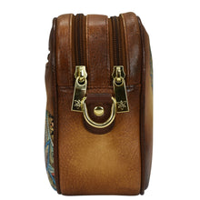 Load image into Gallery viewer, Anuschka Twin Top Messenger - 704, with dual zippers, a decorative metal ring on the front, and an adjustable strap.
