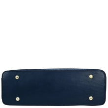 Load image into Gallery viewer, Bottom view of a navy blue Anuschka genuine leather hobo with chain strap - 707 with metallic studs and a chain detail shoulder strap on a white background.

