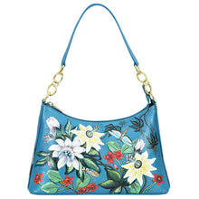 Load image into Gallery viewer, Blue floral leather Anuschka hobo bag with a chain strap and gold-tone hardware.
