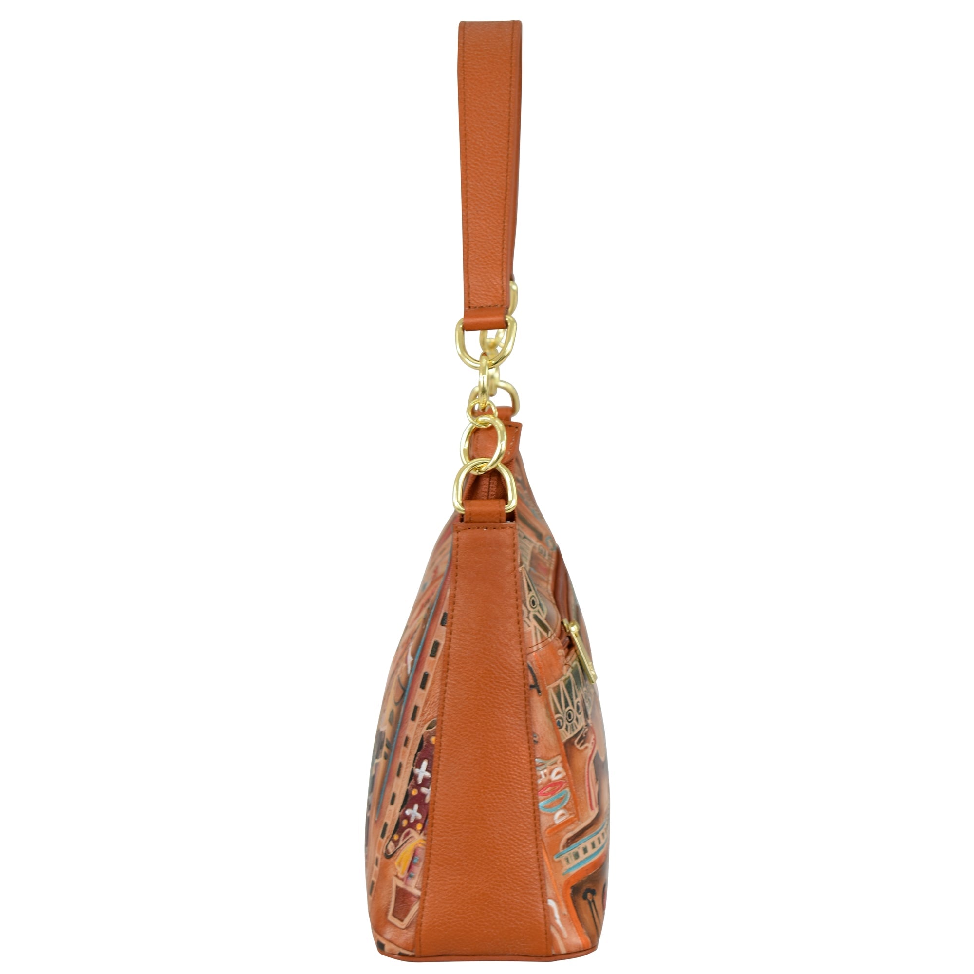 Side view of the Anuschka Zip-Top Shoulder Hobo - 707, an orange handbag featuring a top handle, gold hardware, a chain detail shoulder strap, and an intricate multicolored patterned design.