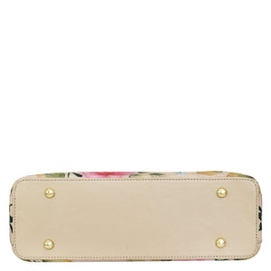 Floral-patterned clutch wallet with beige background, gold-tone stud accents, and a shoulder strap - Anuschka Hobo With Chain Strap - 707.