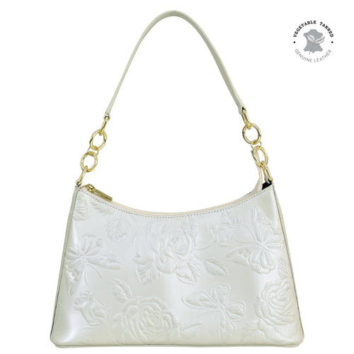 White Anuschka genuine leather hobo handbag with floral embossing and gold-tone hardware, including a chain strap - style 707.