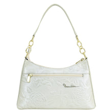 Load image into Gallery viewer, White embossed genuine leather Anuschka handbag with gold-tone hardware.
