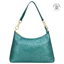 Load image into Gallery viewer, Genuine leather teal Anuschka shoulder bag with floral embossing and gold-tone hardware.
