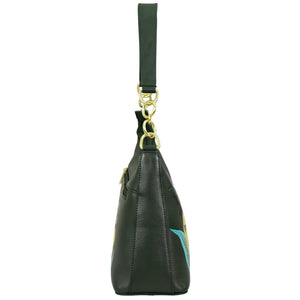 Side view of the Anuschka Zip-Top Shoulder Hobo - 707 in dark green genuine leather, featuring a gold chain detail and a short handle.