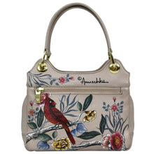 Load image into Gallery viewer, Beige leather Satchel With Crossbody Strap - 708 with floral and bird print design and gold-tone hardware by Anuschka.

