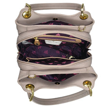 Load image into Gallery viewer, Open Anuschka gray leather satchel with a purple interior and multiple compartments for organization, displayed from a top-down perspective.
