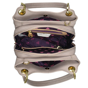 Open Anuschka gray leather satchel with a purple interior and multiple compartments for organization, displayed from a top-down perspective.