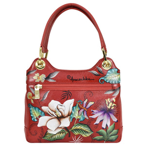 A red floral-print leather Satchel With Crossbody Strap - 708 by Anuschka with gold-tone hardware.