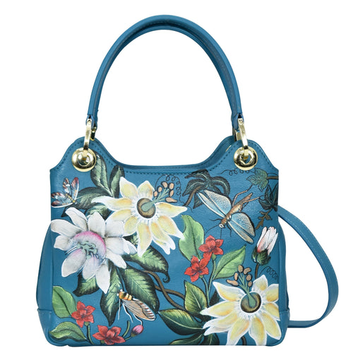 Anuschka Blue floral leather satchel with crossbody strap and gold-tone hardware.