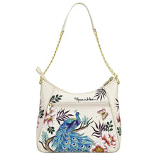 Load image into Gallery viewer, Anuschka&#39;s Ivory-colored Zip-Top Shoulder Hobo - 709 handbag with a peacock and floral print, featuring a genuine leather chain strap.
