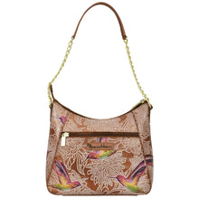 Load image into Gallery viewer, A Zip-Top Shoulder Hobo - 709 by Anuschka with a bird and floral print design, featuring a chain link detail strap.
