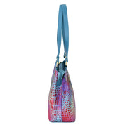 Multicolored Anuschka genuine leather crocodile skin pattern Medium Everyday Tote - 710 with a blue strap.